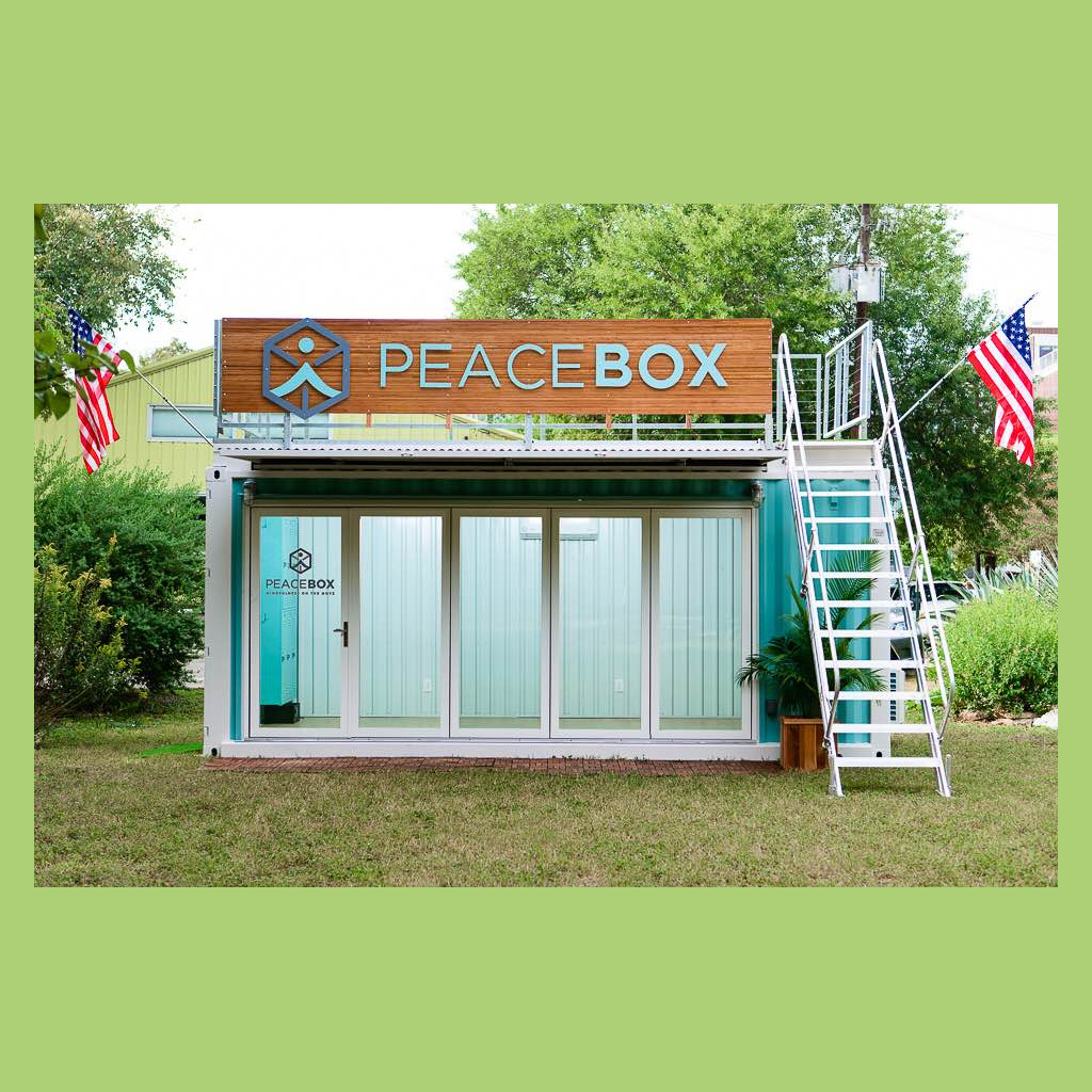 A large container with a sign on the side of it.