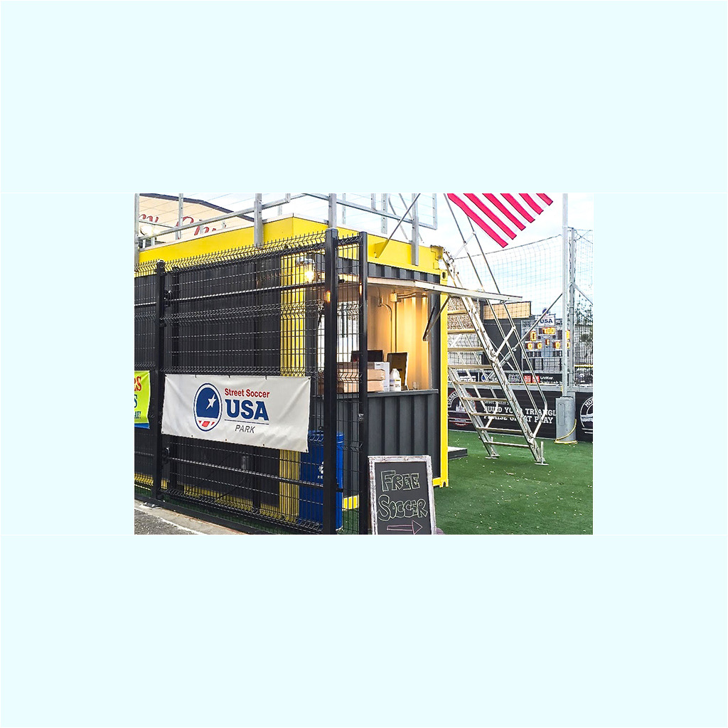 A black and yellow container with a sign on it