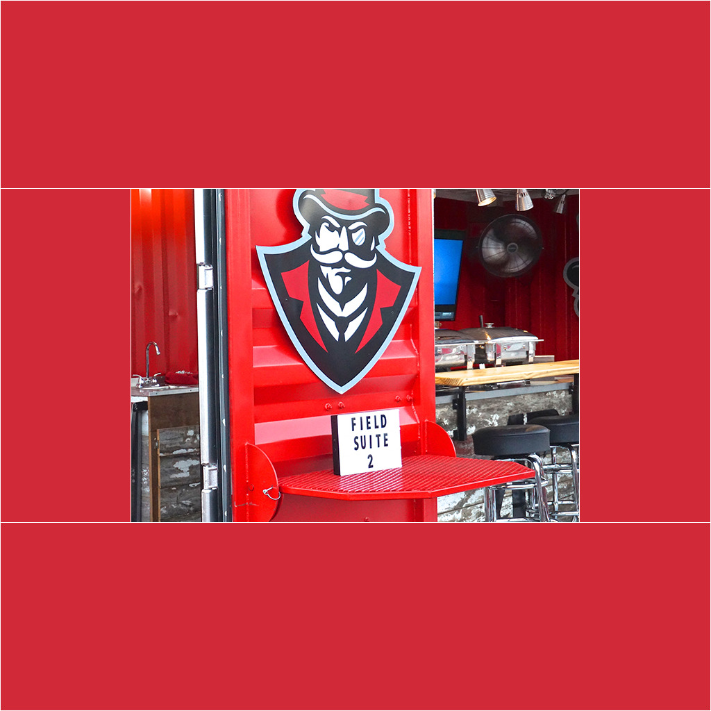 A red chair with a sign on it