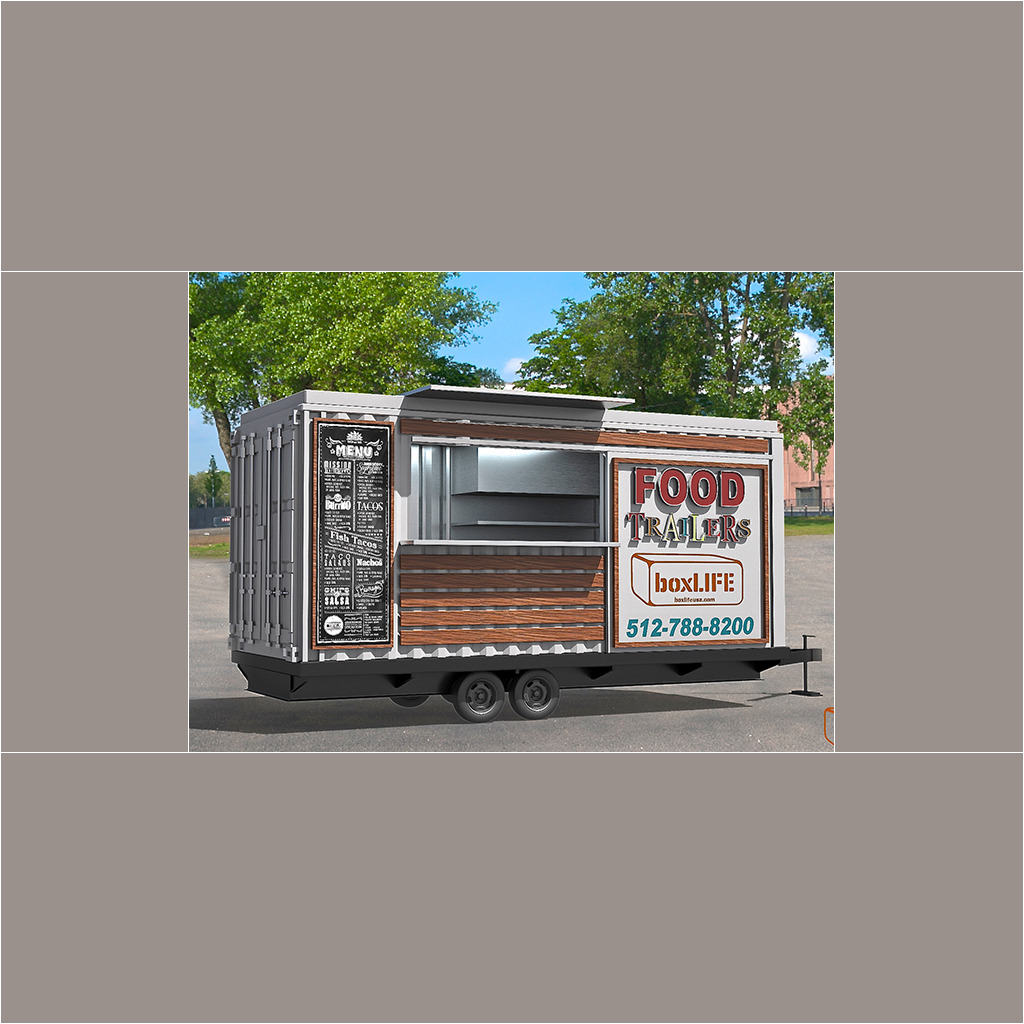 A food trailer parked on the side of the road.