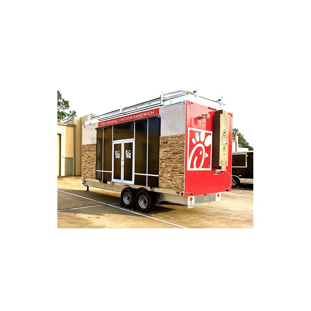 A large trailer with a chicken shop on it.