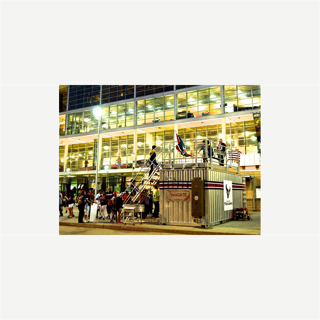 A group of people standing outside of a building.