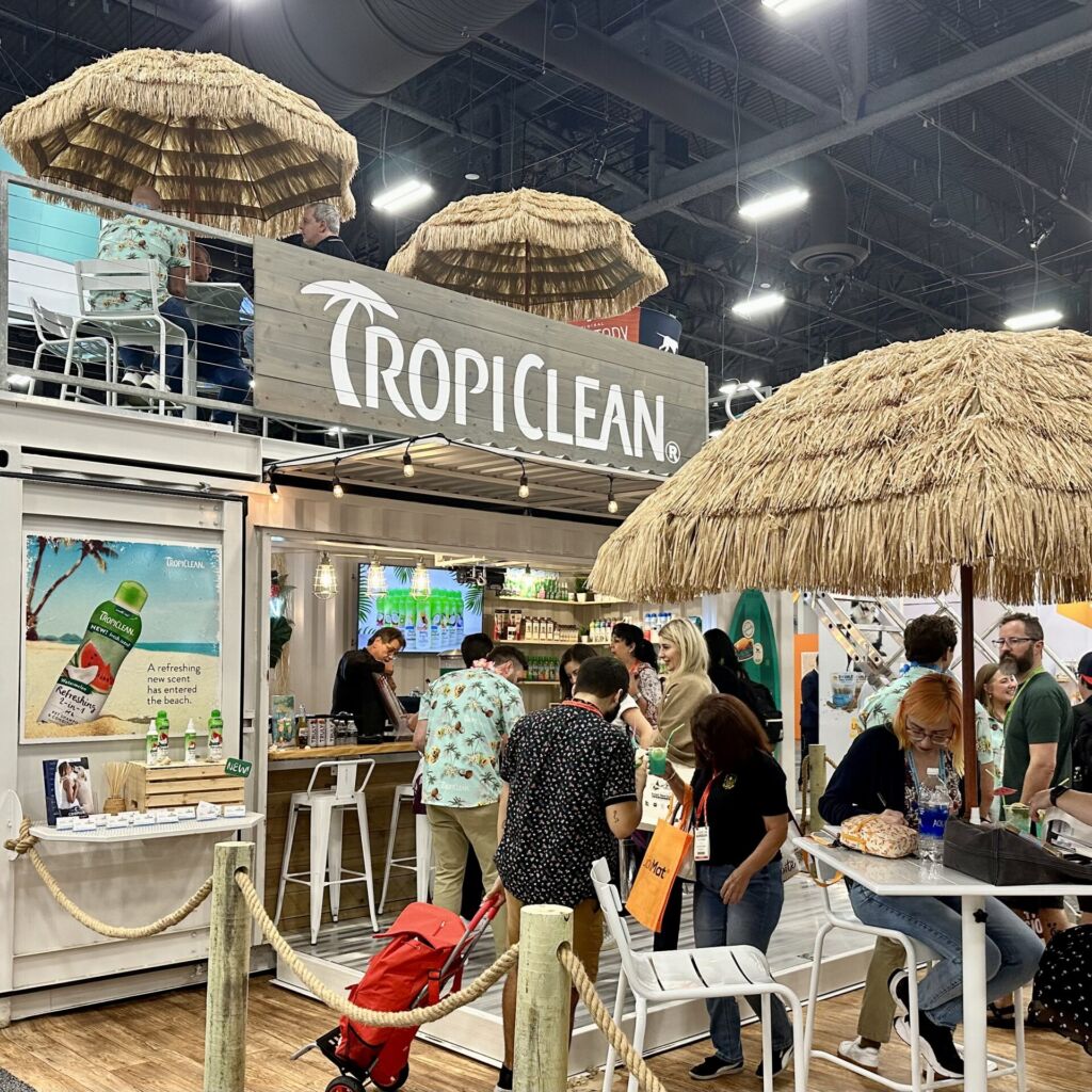 A group of people standing around at an event.