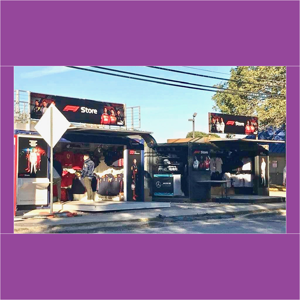 A store with two different stores on the side of it.