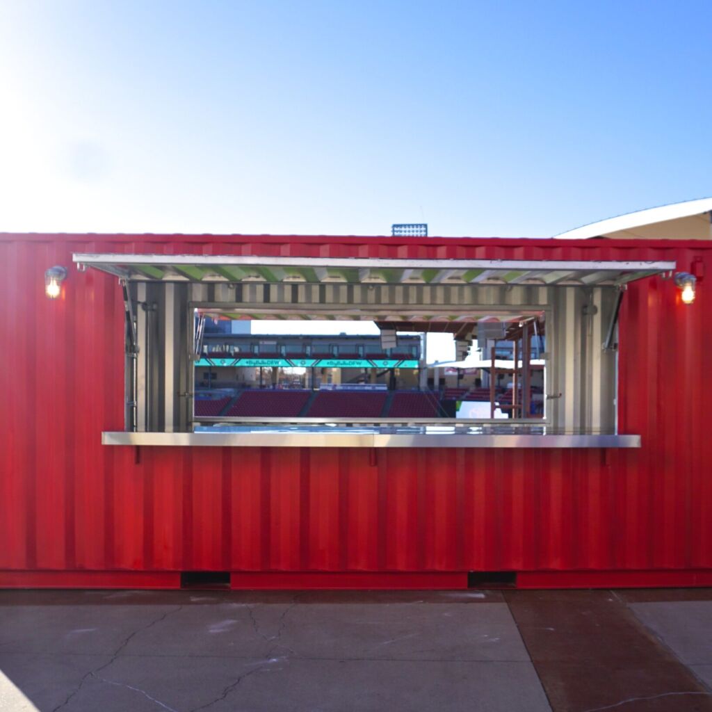 A red container with lights on top of it.