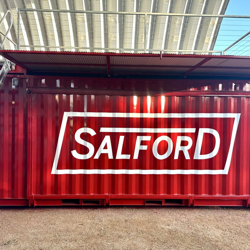 A red container with the word salford on it.